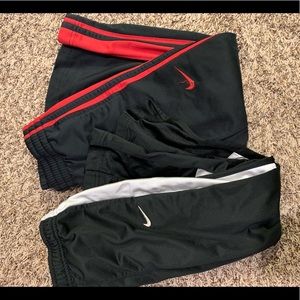 Two pairs of boys nike long pants